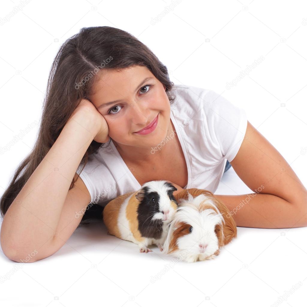 Teenage girl with guinea pig