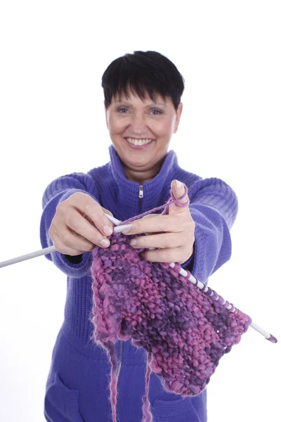 Elder woman with knitting — Stock fotografie