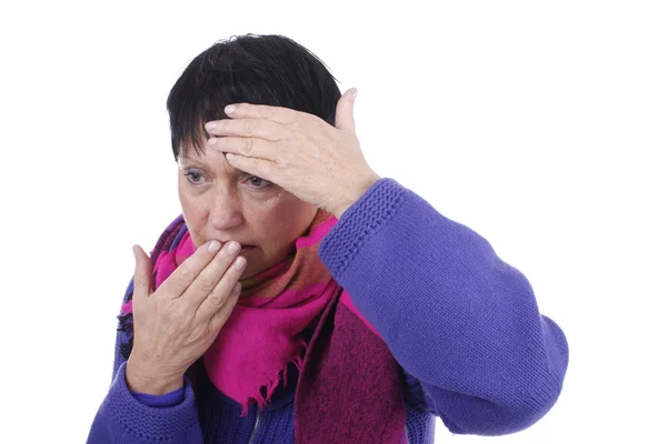 Elderly woman with fever and coughing — Stockfoto