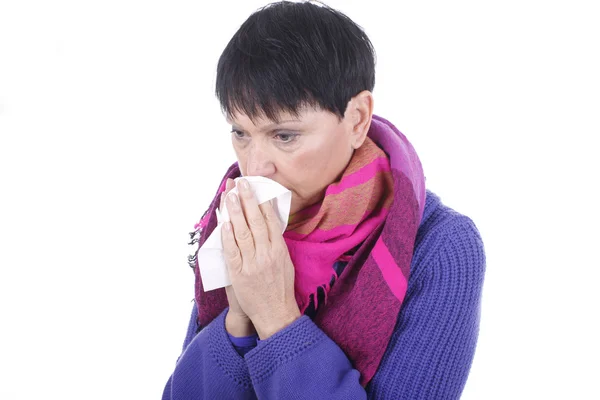 Elder woman with handkerchief and cold — Stockfoto