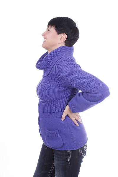 Пожилая женщина с болью в спине — стоковое фото
