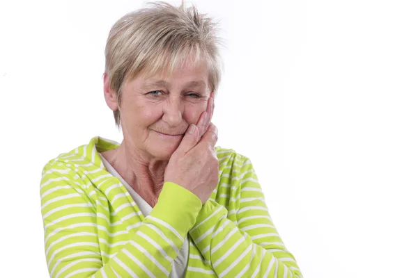 Пожилая женщина с зубной болью — стоковое фото