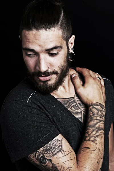 Young man with tattoo — Stock Photo, Image