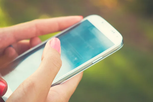 Mobile phone in  hands — Stock Photo, Image