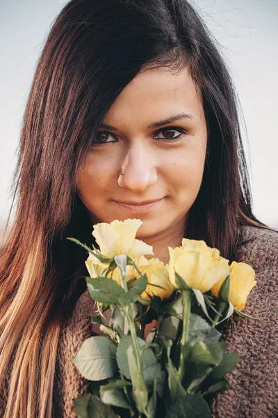 Portrait of  woman with roses — Stock Photo, Image