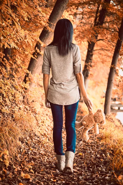 Teddy bear and girl — Stock Photo, Image