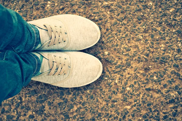 Woman jeans and sneaker shoes — Stock Photo, Image