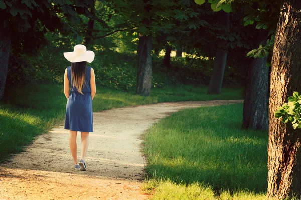 Woman in outdoor wearing blue dress — Stock Photo, Image