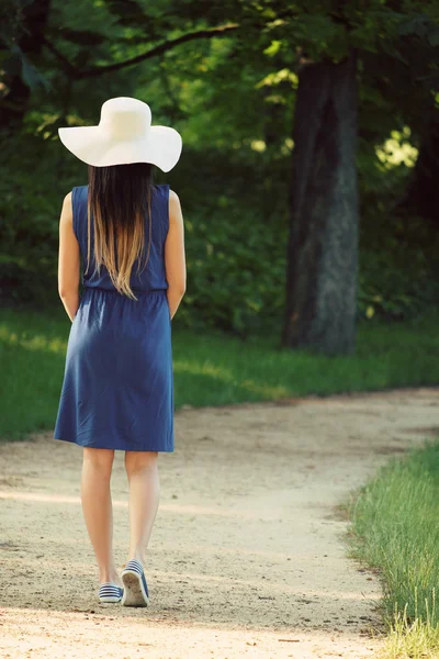 Woman in outdoor wearing blue dress — Stock Photo, Image