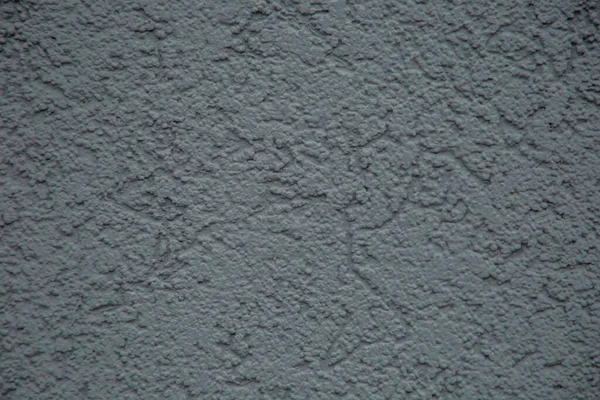 Серый фон с текстурированным рисунком, видимыми полосами и неровностями — стоковое фото
