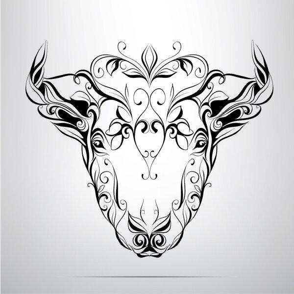 Голова быка в орнаменте
