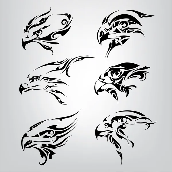 Silhouette de têtes d'oiseaux . — Image vectorielle