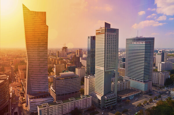 Modern architecture - skyscrapers at sunset, aerial panorama of Warsaw downtown, Poland