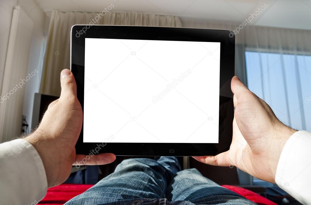 Man with tablet relaxing - point of view photo