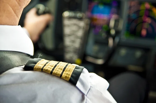 Captain epaulet - shoulder of a jet airliner pilot — Stock Photo, Image