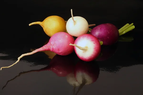 Fresh radish on black background — Stock Photo, Image