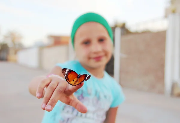 Motyl na palec — Zdjęcie stockowe