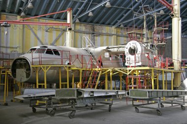 Ukraine, Kiev Repair Plant, 2015. Overhaul of aircraft metal han clipart