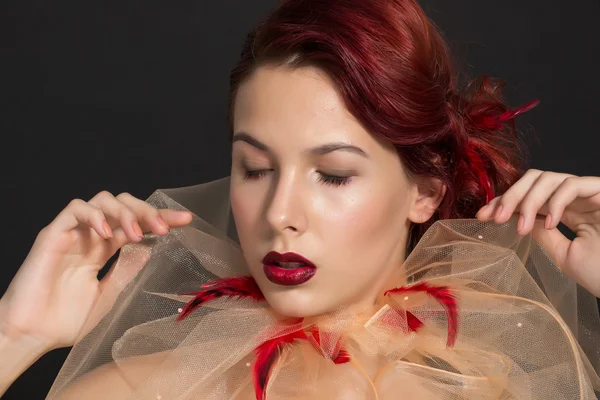 Redheaded girl with transparent fabric - tulle — Stock Photo, Image