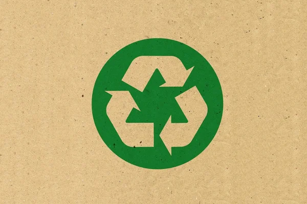 Logotipo de reciclagem em papel castanho — Fotografia de Stock