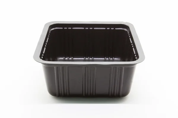 Чорний пластиковий харчовий контейнер — стокове фото