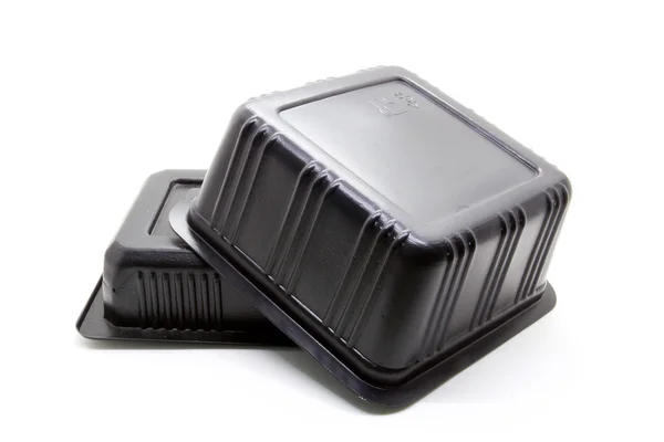 Récipient alimentaire en plastique noir — Photo