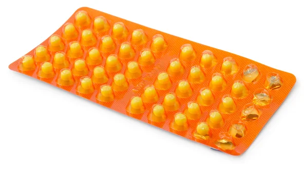 Comprimidos numa embalagem blister isolada — Fotografia de Stock