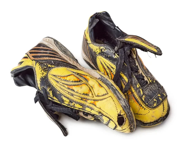 Грязная футбольная обувь — стоковое фото