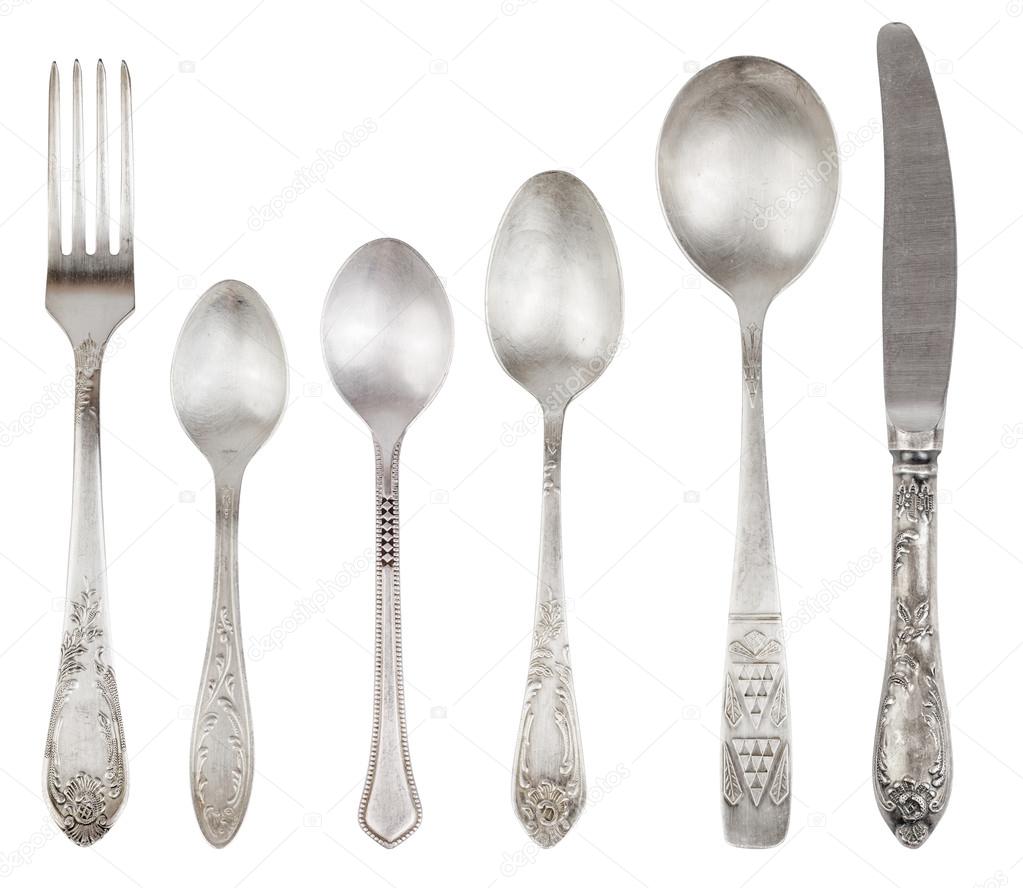 Aged vintage silver fork, knife, spoons