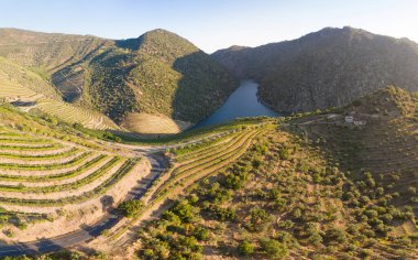 Dramatic sunset over the agricultural landscape Aerial shot, countryside landscape during summer or spring time. Fields and meadows in Moravia, Czech republic. Sunset time
