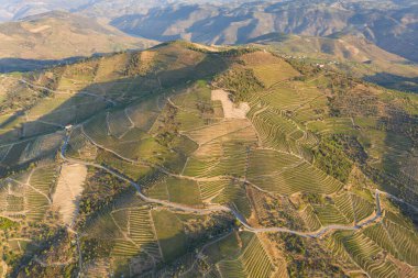 Dramatic sunset over the agricultural landscape Aerial shot, countryside landscape during summer or spring time. Fields and meadows in Moravia, Czech republic. Sunset time
