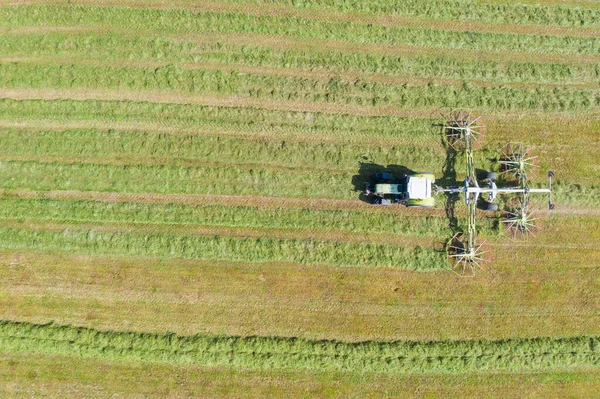 Close Tractor Turning Cut Grass Dry Hay Rural Landscape New — Stock Photo, Image