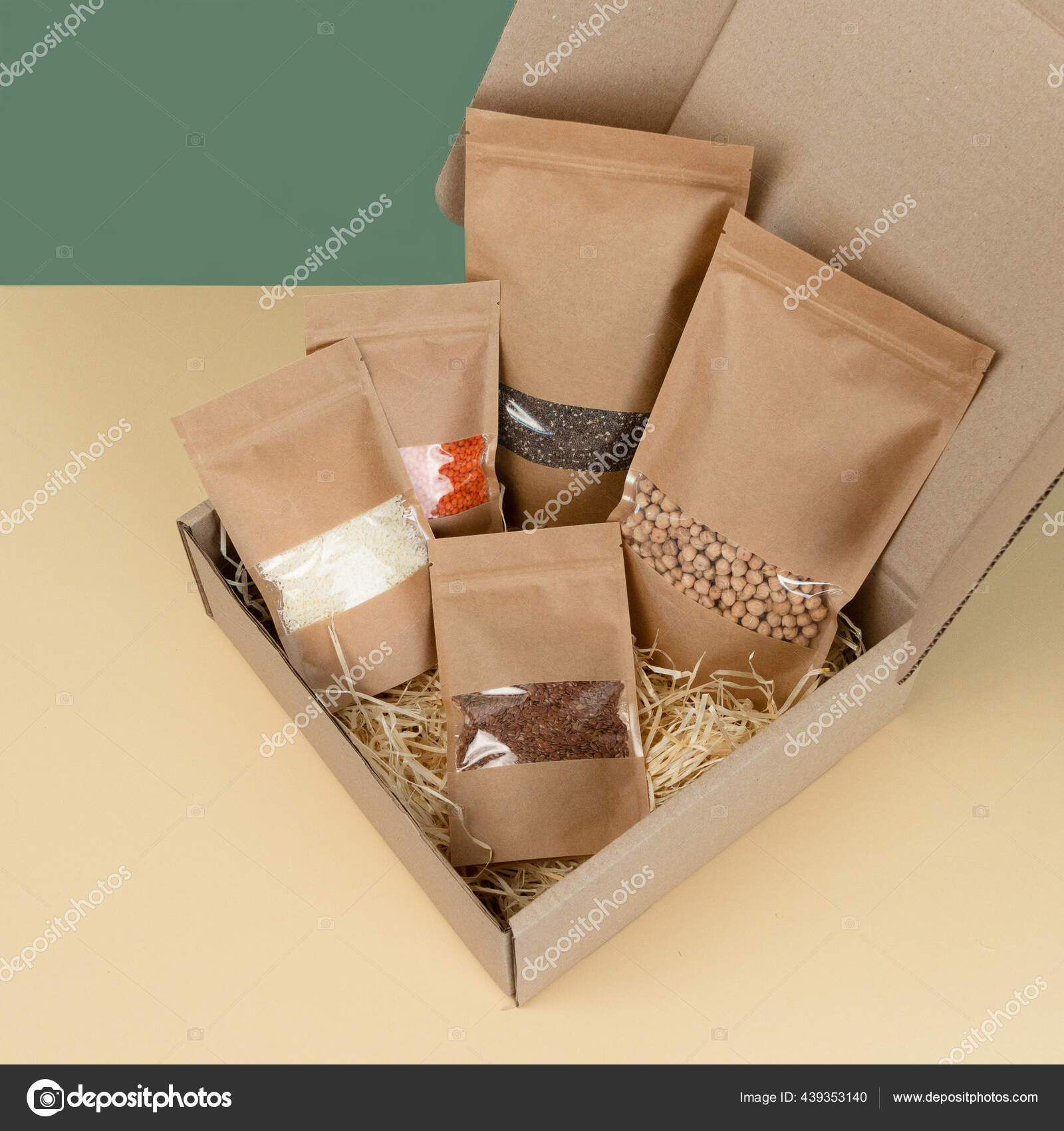 Download Brown Kraft Paper Doypack Bags With Groceries Front View On A Yellow Background Packaging For Foods And Goods Template Mock Up Packs With Windows For Weight Products Stock Photo Image By C