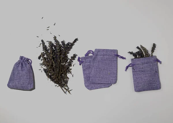 Handmade lavender sachet in textile bags. Dry lavender flowers for filling. Protection from moths. — Stock Photo, Image