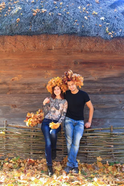 Young couple in autumn — Stock Photo, Image