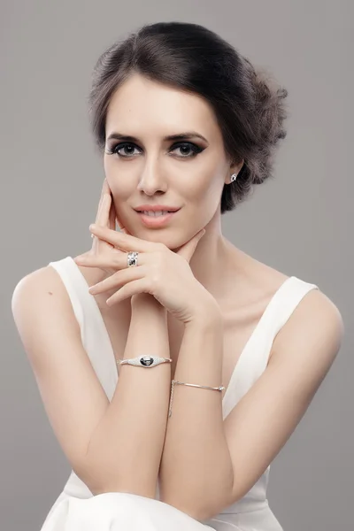 Beautiful Elegant Woman in White Dress Wearing Jewelry — Stock Photo, Image