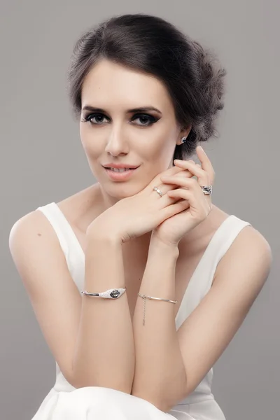 Beautiful Elegant Woman in White Dress Wearing Jewelry — Stock Photo, Image