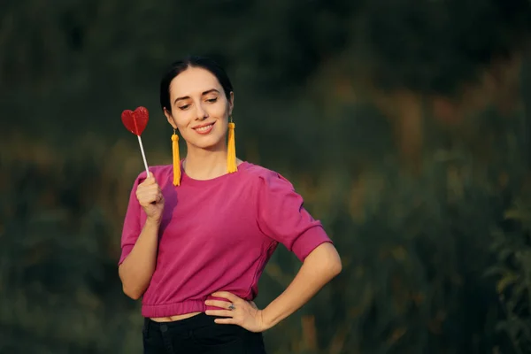 Woman Holding Heart Shaped Lollipop Candy — Stok Foto