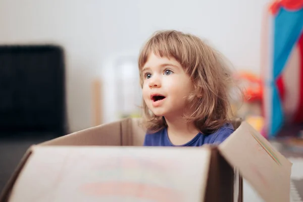 Toddler Girl Playing Cardboard Box Home — Stock Photo, Image