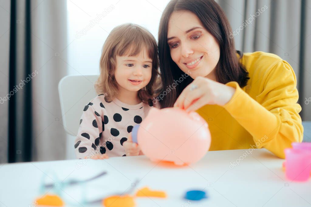 Cheerful Mom and Daughter Learning Financial Education with Piggy Bank