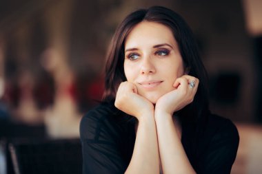 Pensive Woman Smiling and Looking Away Thinking of Something