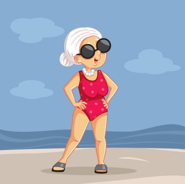 Kıdemli bayan sahilde yaz tatilinin tadını çıkarıyor.