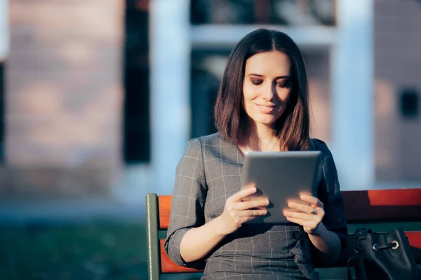 Woman Sitting Bench Park Holding Tablet — ストック写真