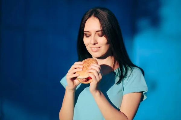 Beautiful Young Woman Holding Delicious Burger — Stok Foto