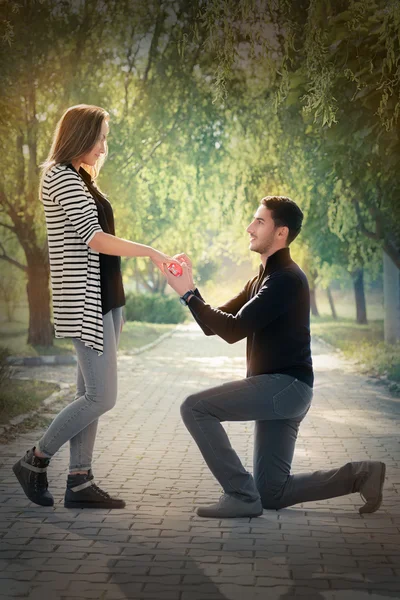 Kneeling Man Proposing with an Engagement Ring — Stock Photo, Image