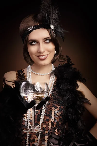 Retro 20s style woman holding champagne glass — Stock Photo, Image