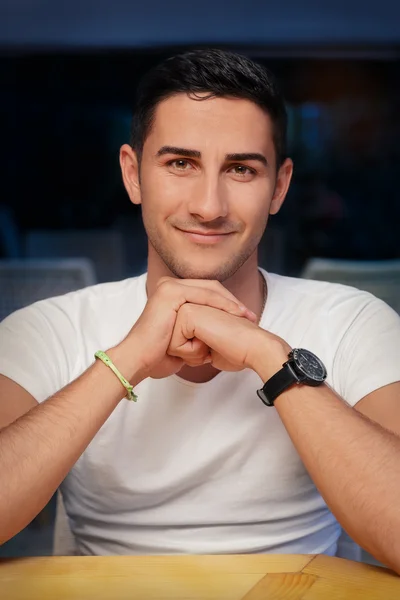 Man Sitting in a Restaurant — Stock Photo, Image