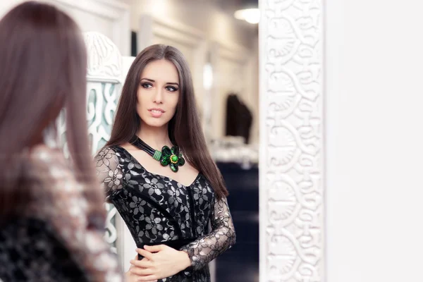 Girl in Black Lace Dress Looking in the Mirror — Stock Photo, Image