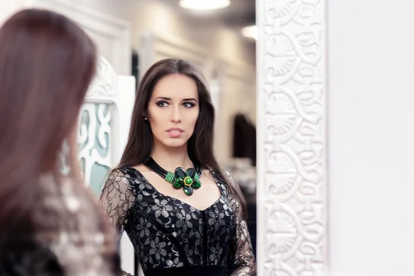 Girl in Black Lace Dress Looking in the Mirror — Stock Photo, Image