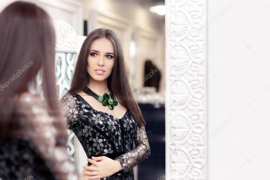 Girl in Black Lace Dress Looking in the Mirror